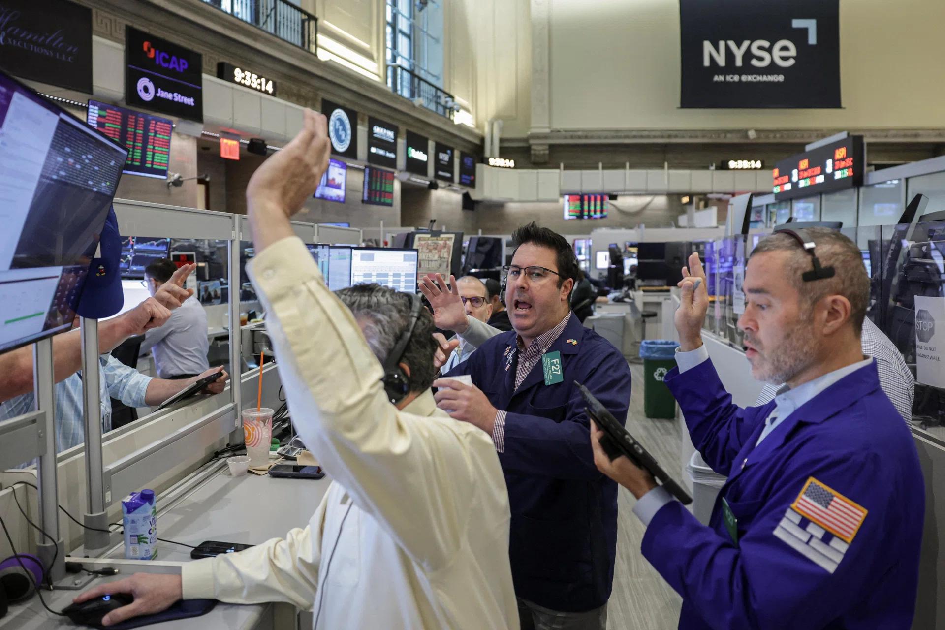 Traders on a stock exchange floor